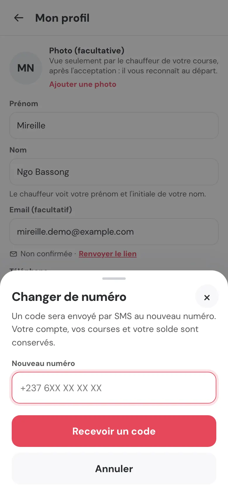 Fenêtre « Changer de numéro » : un code sera envoyé par SMS au nouveau numéro, votre compte, vos courses et votre solde sont conservés ; champ « Nouveau numéro » et bouton « Recevoir un code ».
