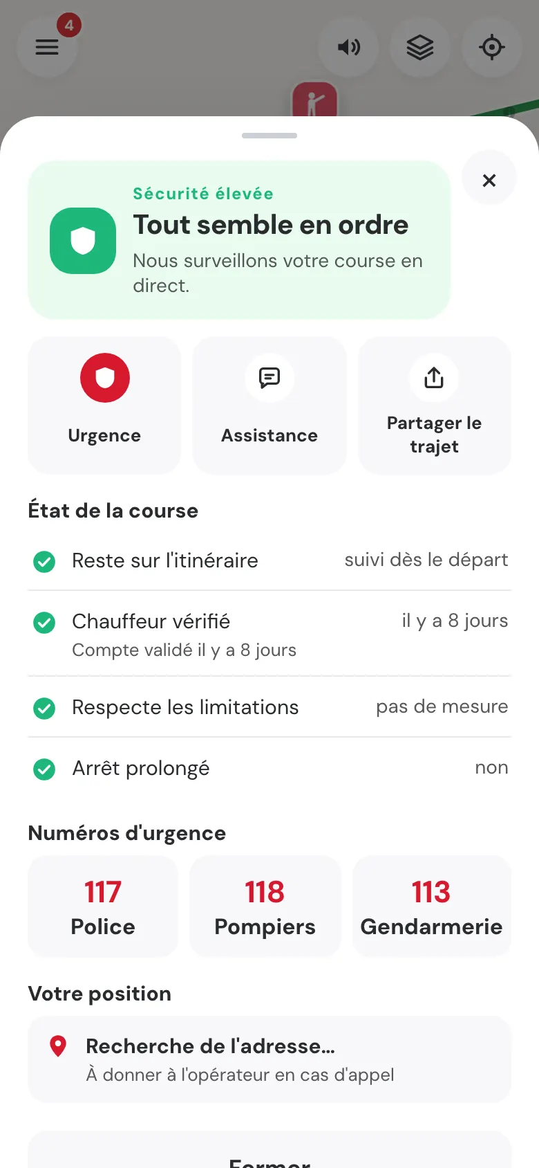 Écran Sécurité pendant une course : « Tout semble en ordre », boutons Urgence, Assistance, Partager le trajet, et la ligne « Chauffeur vérifié · Compte validé ».